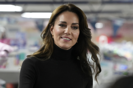 FILE - Britain's Kate, Princess of Wales smiles during her visit to Sebby's Corner in north London, Friday, Nov. 24, 2023. Princess Kate apologized Monday, March 11, 2024 for &ldquo;confusion&rdquo; caused by her editing of a family photo released by the palace &mdash; an image of the British royal and her children that was intended to calm concern and speculation about the princess's health, but had the opposite effect. (AP Photo/Frank Augstein, Pool, File )