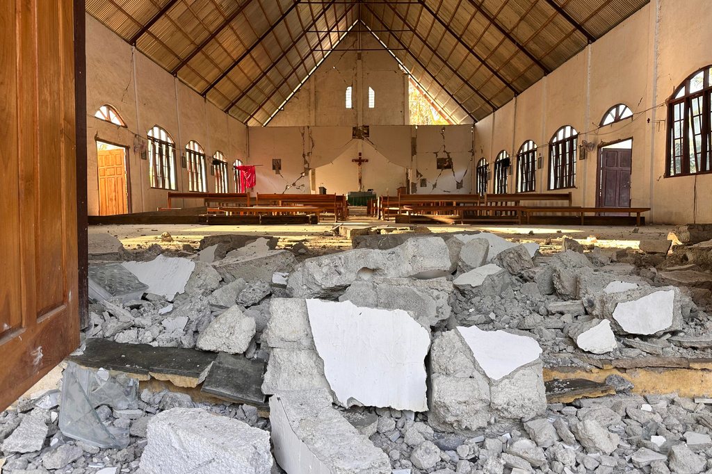 Rubble is seen at the entrance of an earthquake-damaged church in Satar Punda, East Nusa Tenggara province, Indonesia, Tuesday, Aug. 18, 2026. (AP Photo/Firdia Lisnawati)