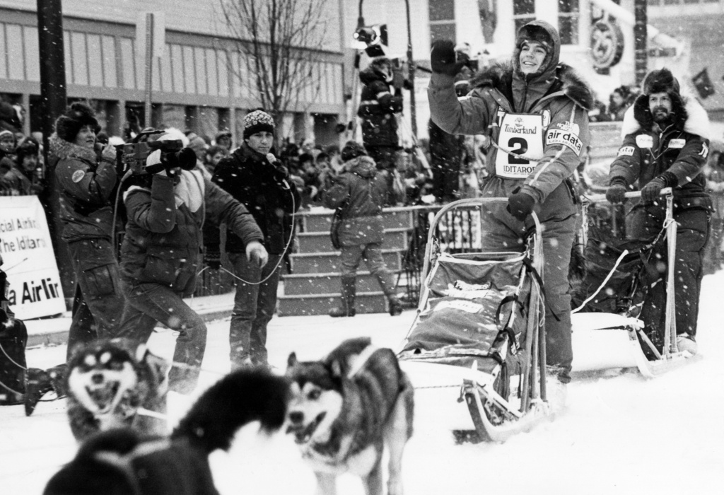 FILE - Susan Butcher races in the Iditarod Trail Sled Dog Race, in Anchorage, Alaska, March 7, 1987. (AP Photo/Rob Stapleton, File)