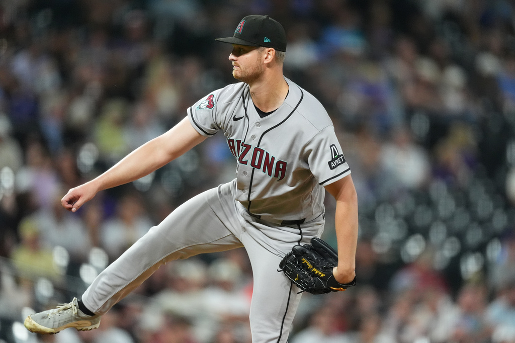 Arizona Diamondbacks starting pitcher Michael Soroka works against the Colorado Rockies in the second inning of a baseball game Tuesday, Sept. 22, 2026, in Denver. (AP Photo/David Zalubowski)