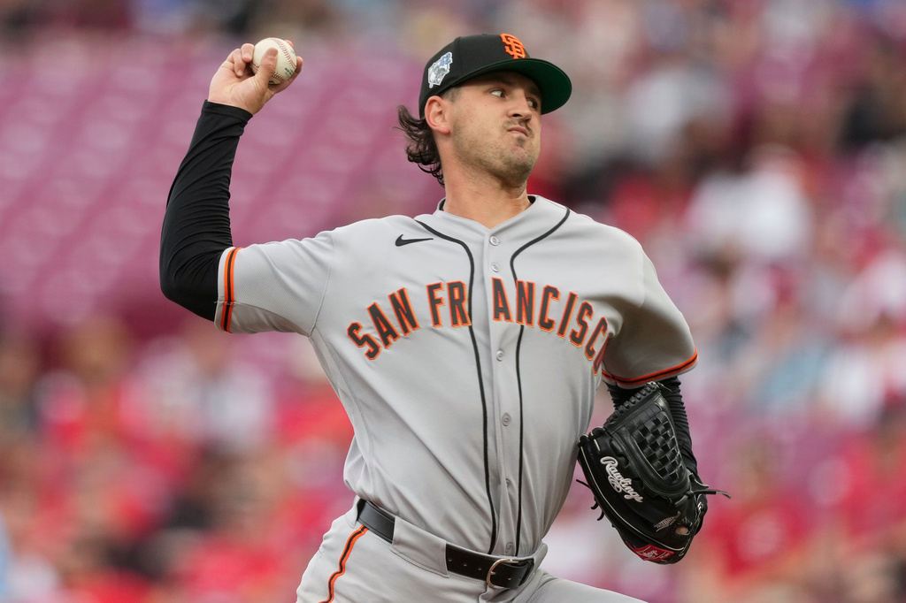 San Francisco Giants pitcher Tyler Mahle throws during the first inning of a baseball game against the Cincinnati Reds in Cincinnati, Wednesday, April 15, 2026. (AP Photo/Carolyn Kaster)