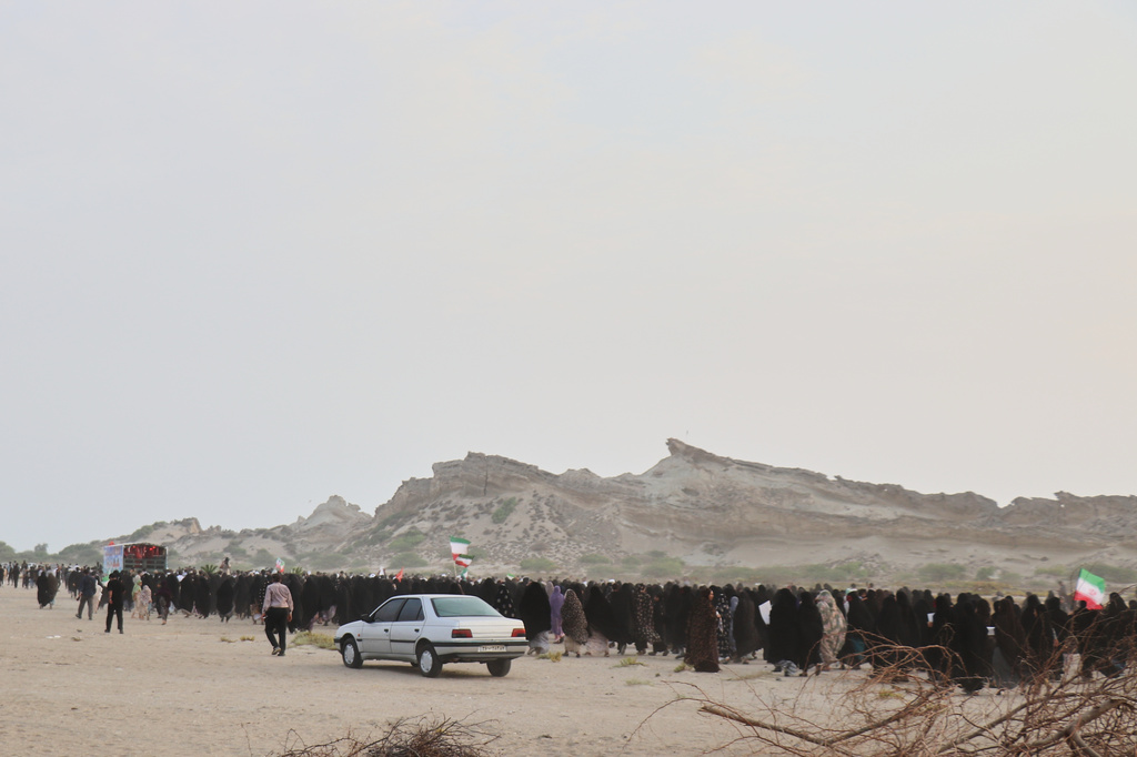 Mourners walk in a mass funeral procession for people killed when, according to Iranian media and a rights group, a U.S. missile struck a home where a wedding was being held in Kuhestak, southern Iran, Thursday, Sept. 3, 2026. (Razieh Poudat/ISNA via AP)