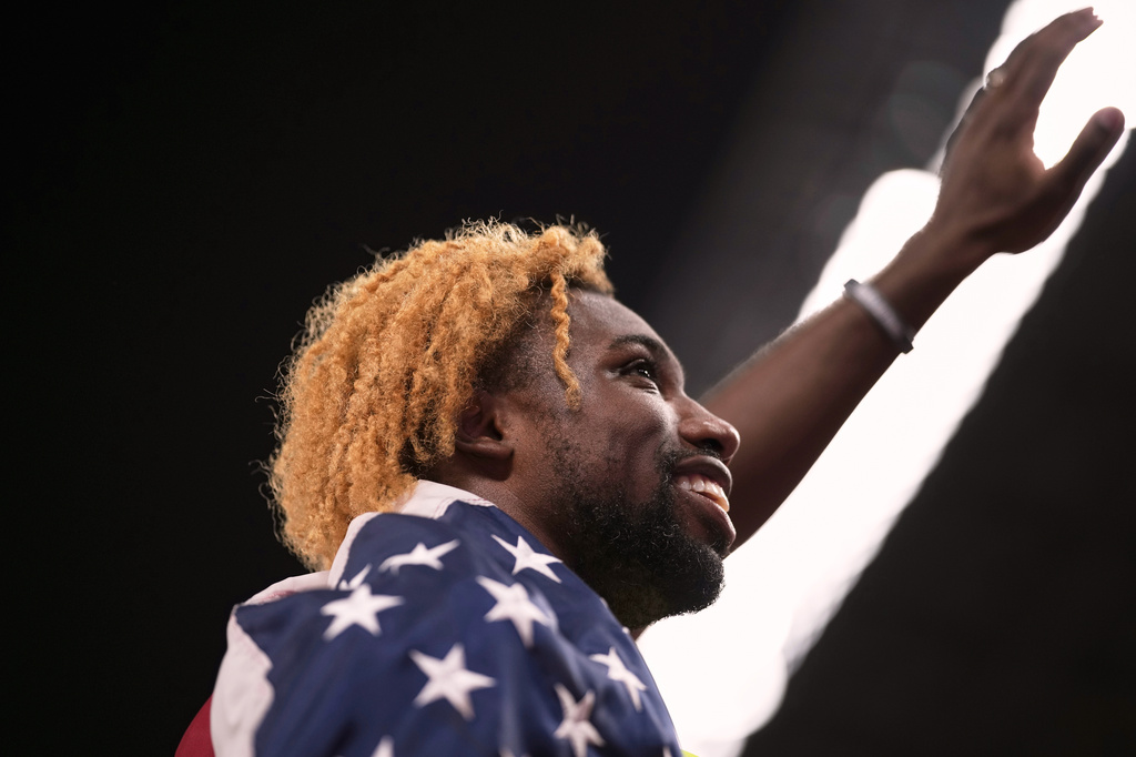 FILE - United States' Noah Lyles gold medalist celebrates after the men's 200 meters final at the World Athletics Championships in Tokyo, Sept. 19, 2025. (AP Photo/Louise Delmotte, File)