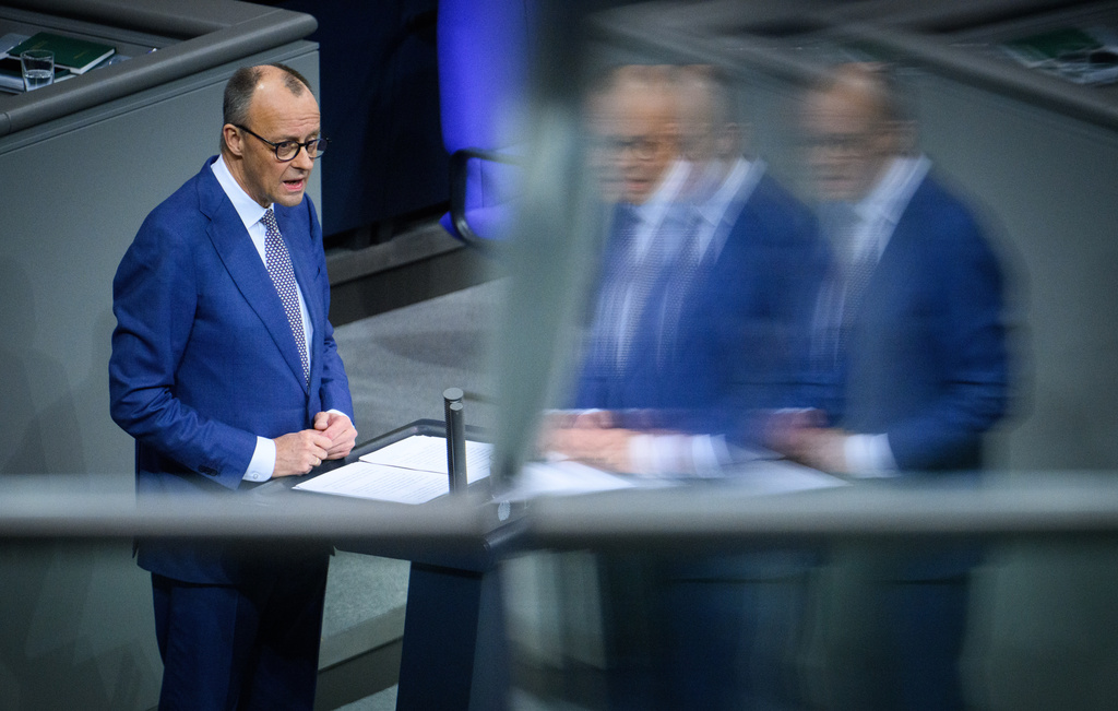 German Chancellor Friedrich Merz makes a government statement on the current foreign policy situation in the German Bundestag, Berlin, Thursday, Jan. 29, 2026. (Bernd von Jutrczenka/dpa via AP)
