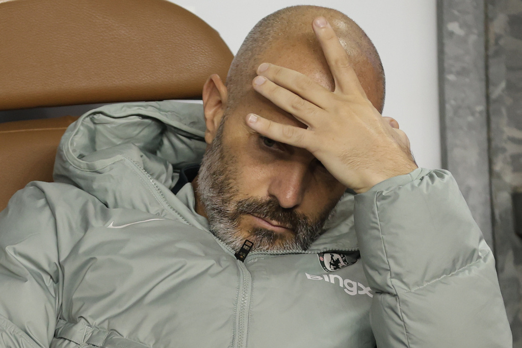 FILE - Chelsea's head coach Enzo Maresca sits on a bench ahead of the Champions League opening phase soccer match between Qarabag and Chelsea in Baku, Azerbaijan, on Nov. 5, 2025. (AP Photo, File)