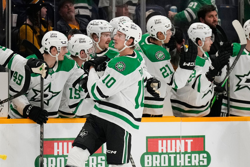 Dallas Stars center Oskar Bäck (10) celebrates his goal with teammates during the second period of an NHL hockey game against the Nashville Predators, Sunday, Oct. 26, 2025, in Nashville, Tenn. (AP Photo/George Walker IV) Dallas Stars center Oskar Bäck (10) celebrates his goal with teammates during the second period of an NHL hockey game against the Nashville Predators, Sunday, Oct. 26, 2025, in Nashville, Tenn. (AP Photo/George Walker IV)
