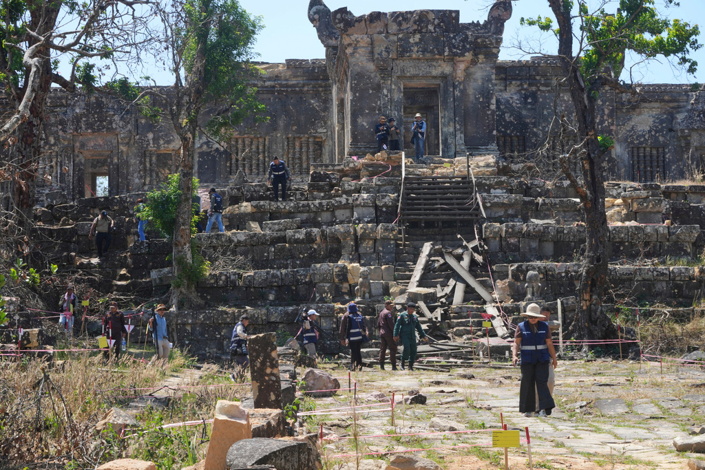 Journalists visit the Preah Vihear temple, damaged during border clashes with Thailand, at Preah Vihear province, Cambodia, Saturday, March 14, 2026. (AP Photo/Heng Sinith)