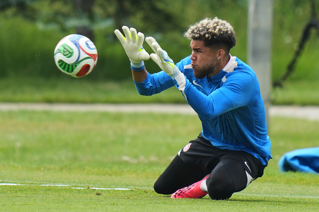 Canada goalkeeper Dayne St. Clair works out during a training session on the eve of the team's World Cup soccer match against Bosnia, Thursday, June 11, 2026, in Toronto. (AP Photo/Stephanie Scarbrough)