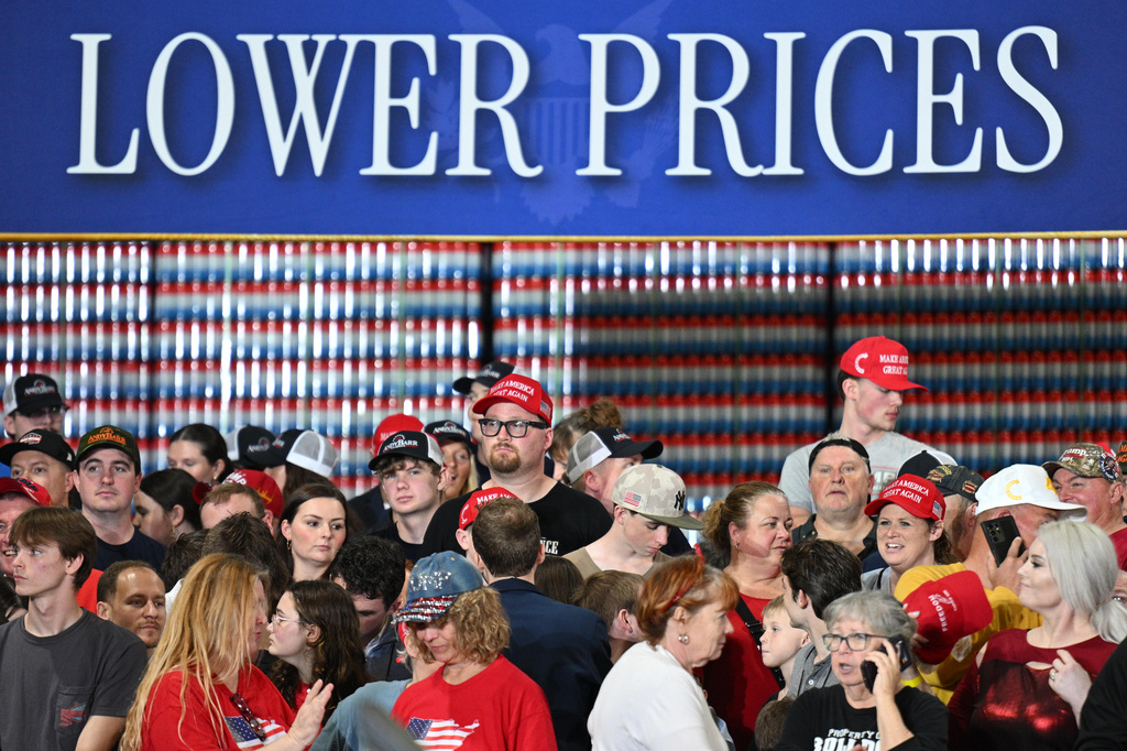 People arrive before President Donald Trump speaks at Verst Logistics in Hebron, Ky., Wednesday, March 11, 2026. (AP Photo/Jon Cherry)