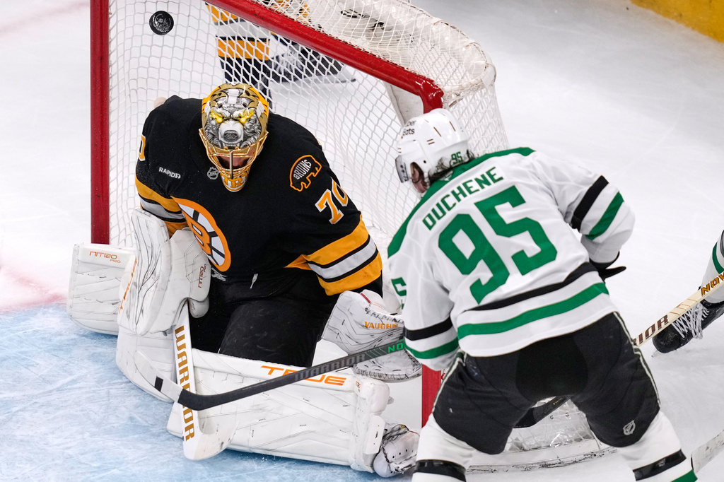 Dallas Stars center Matt Duchene, right, scores against Boston Bruins goaltender Joonas Korpisalo (70) during the second period of an NHL hockey game, Tuesday, March 31, 2026, in Boston. (AP Photo/Charles Krupa)