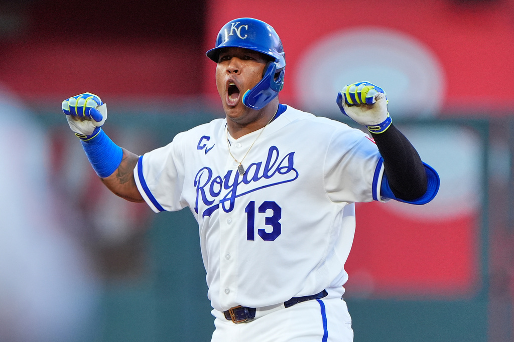 Kansas City Royals' Salvador Perez celebrates on second after hitting an RBI double during the fourth inning of a baseball game against the Athletics, Wednesday, Aug. 19, 2026, in Kansas City, Mo. (AP Photo/Charlie Riedel)