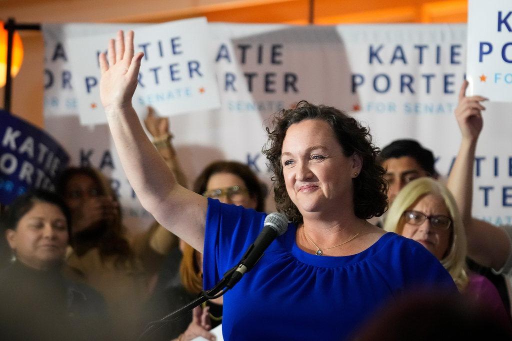 FILE - U.S. Rep. Katie Porter, D-Calif., waves at supporters at an election night party, March 5, 2024, in Long Beach, Calif. (AP Photo/Damian Dovarganes, File)