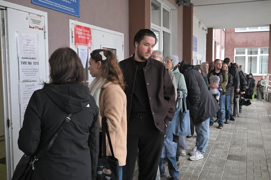 People line up to vote at a polling station during the parliamentary election in St. Petersburg, Russia, Sunday, Sept. 20, 2026. (AP Photo/Andrey Bok)