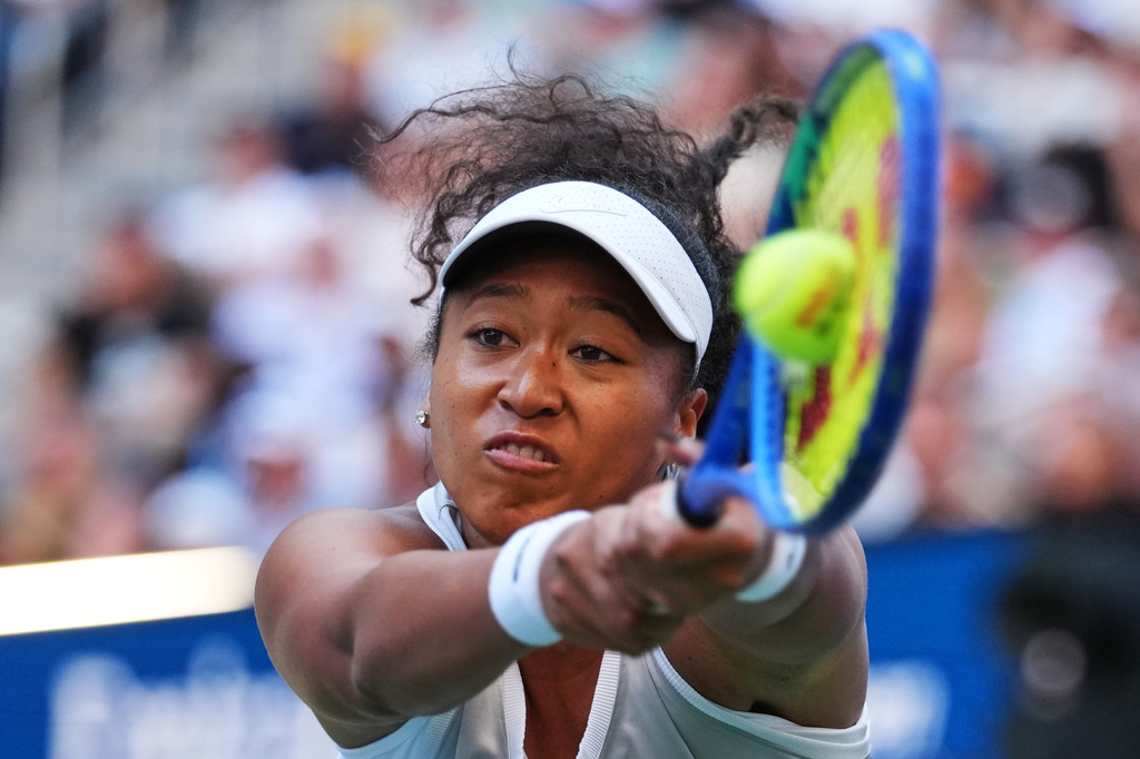 Naomi Osaka, of Japan, returns the ball to Elena Rybakina, of Kazakhstan, during the fourth round of the U.S. Open tennis championships, Monday, Sept. 7, 2026, in New York. (AP Photo/Kirsty Wigglesworth)