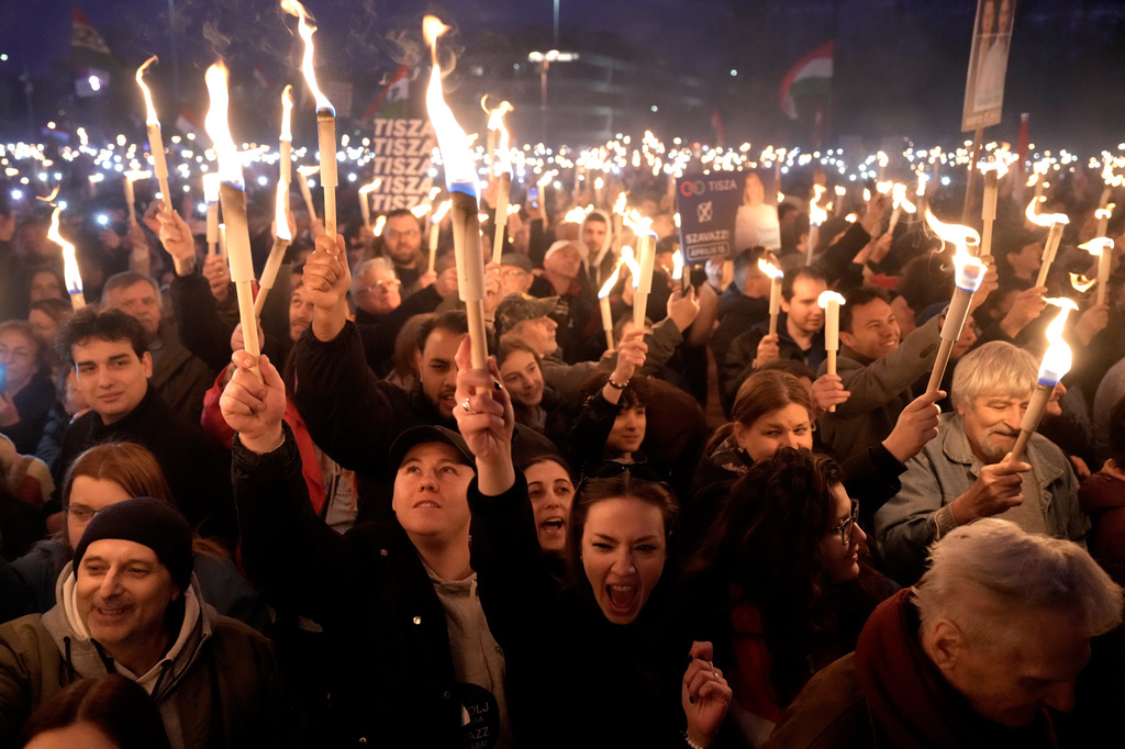 Supporters attend a final election rally of Peter Magyar, the leader of the opposition Tisza party in Debrecen, Hungary, Saturday, April 11, 2026. (AP Photo/Darko Bandic)