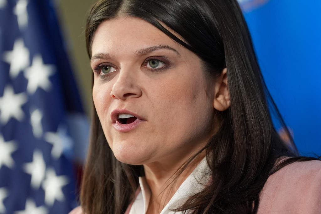 Rep. Haley Stevens, D-Mich., left, a candidate in the Democratic primary for U.S. Senate in Michigan, speaks during a campaign event at the UA Local Plumbers 98 Union Hall, Sunday, Aug. 2, 2026, in Madison Heights, Mich. (AP Photo/Julia Demaree Nikhinson)