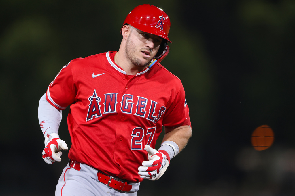 Los Angeles Angels' Mike Trout jogs around the bases after hitting a solo home run during the fourth inning of a baseball game against the Athletics Wednesday, Sept. 23, 2026, in West Sacramento, Calif. (AP Photo/Scott Marshall)