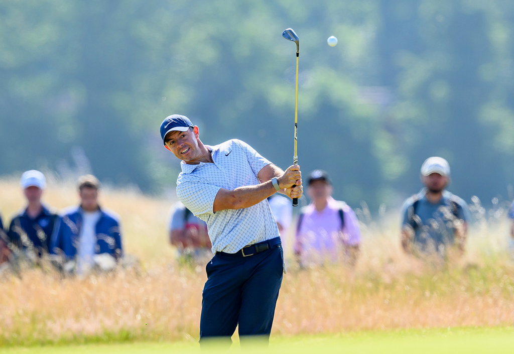 Rory McIlroy, of Northern Ireland, plays on the 14th fairway during day one of the Genesis Scottish Open 2026 at The Renaissance Club in North Berwick, Scotland, Thursday, July 9, 2026. (Malcolm Mackenzie/PA via AP)