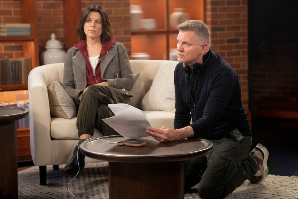 This image released by Paramount Pictures shows Neve Campbell, left, with director Kevin Williamson on the set of "Scream 7." (Paramount Pictures via AP)