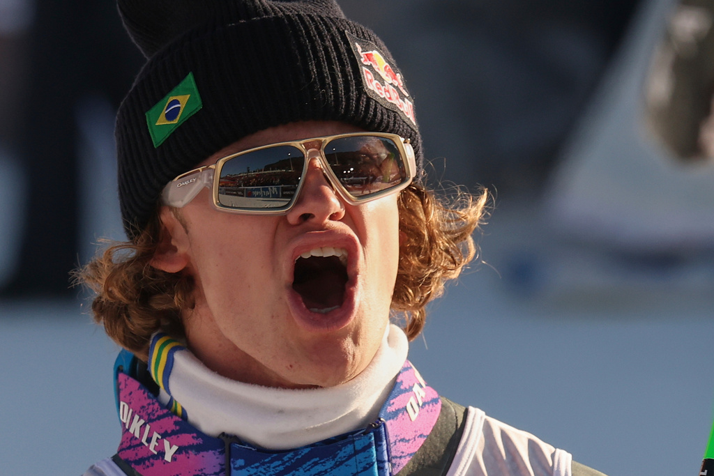Brazil's Lucas Pinheiro Braathen celebrates at the finish area of an alpine ski, men's World Cup Giant slalom, in Alta Badia, Italy, Sunday Dec. 21, 2025. (AP Photo/Alessandro Trovati)