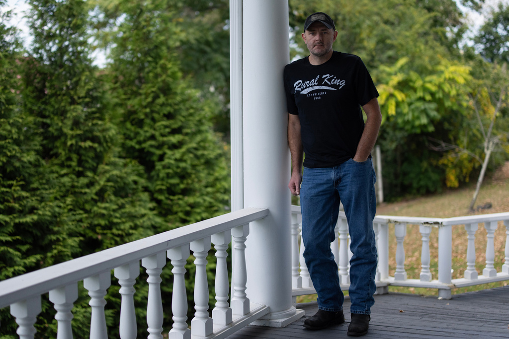 Mark F. Powell, a fourth-generation coal miner in southern West Virginia, stands for a portrait at attorney Sam Petsonk's office Thursday, Sept. 18, 2025, in Oak Hill, W.Va. (AP Photo/Carolyn Kaster)