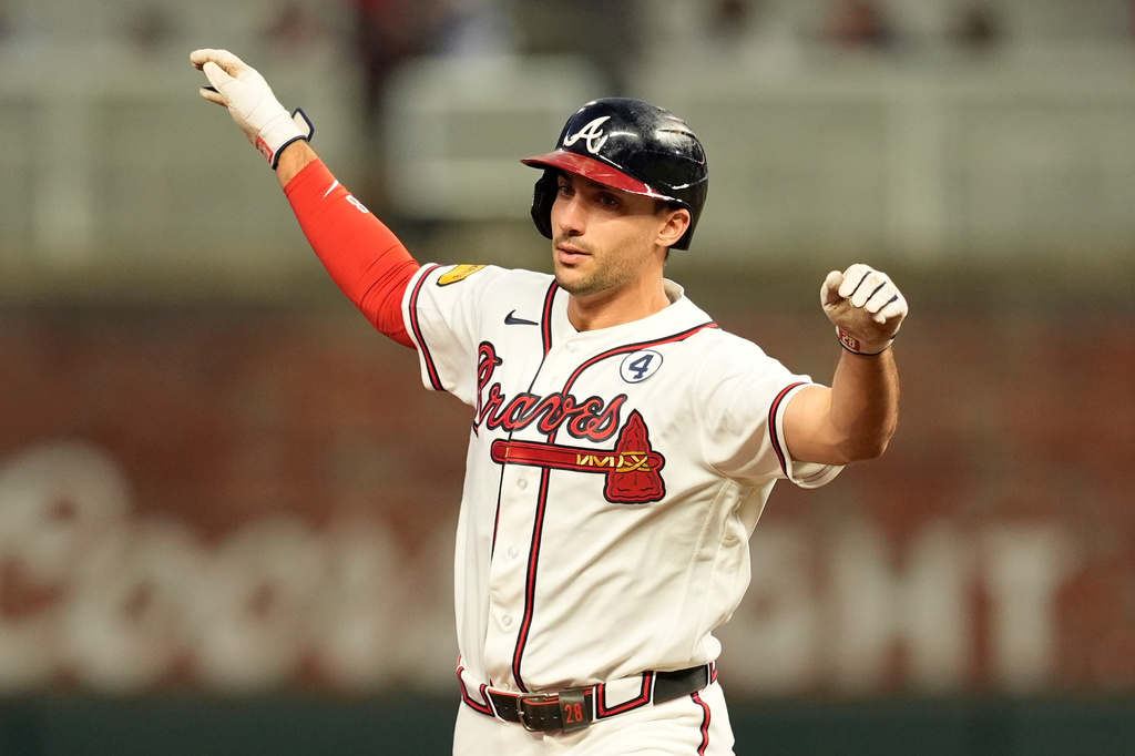 Atlanta Braves first baseman Matt Olson (28) runs after hitting a solo homerun in the sixth inning of a baseball game against the Toronto Blue Jays, Tuesday, June 2, 2026, in Atlanta. (AP Photo/Mike Stewart)