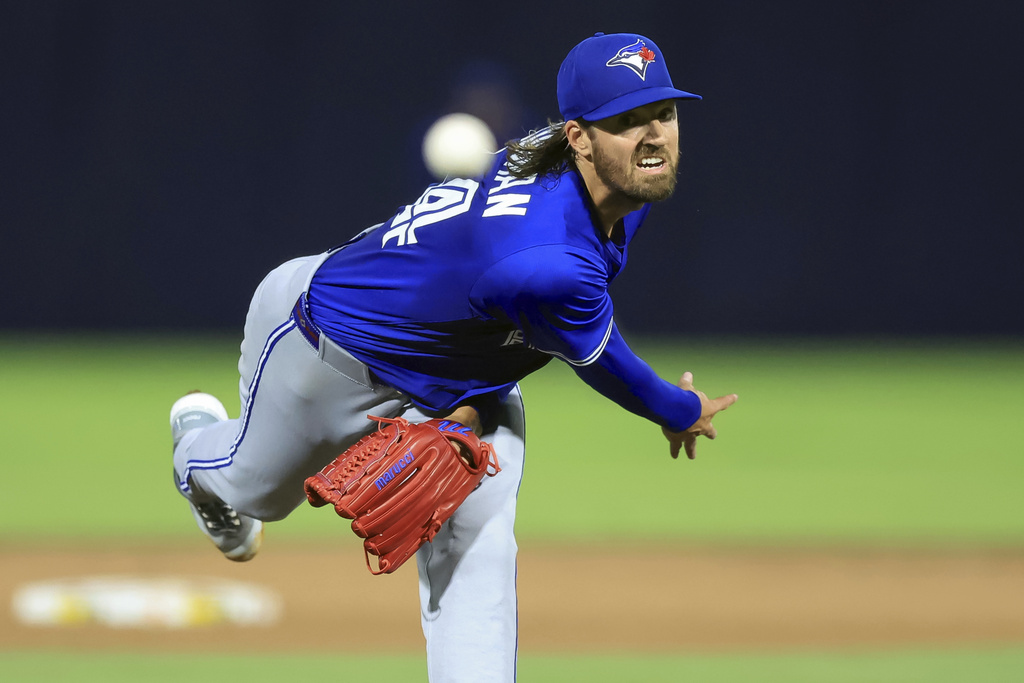 Toronto Blue Jays pitcher Kevin Gausman throws against the Tampa Bay Rays during the first inning of a baseball game Wednesday, Sept. 17, 2025, in Tampa, Fla. (AP Photo/Mike Carlson)