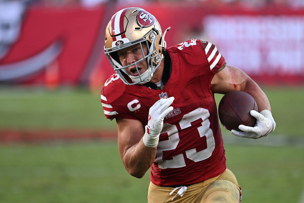 San Francisco 49ers running back Christian McCaffrey (23) runs against the Tampa Bay Buccaneers during the second half of an NFL football game in Tampa, Fla., Sunday, Oct. 12, 2025. (AP Photo/Jason Behnken)