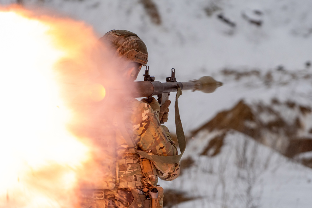 Ukrainian servicemen of special police unit take part in training at the training field in Kharkiv region, Ukraine, Friday, Feb. 13, 2026. (AP Photo/Andrii Marienko)