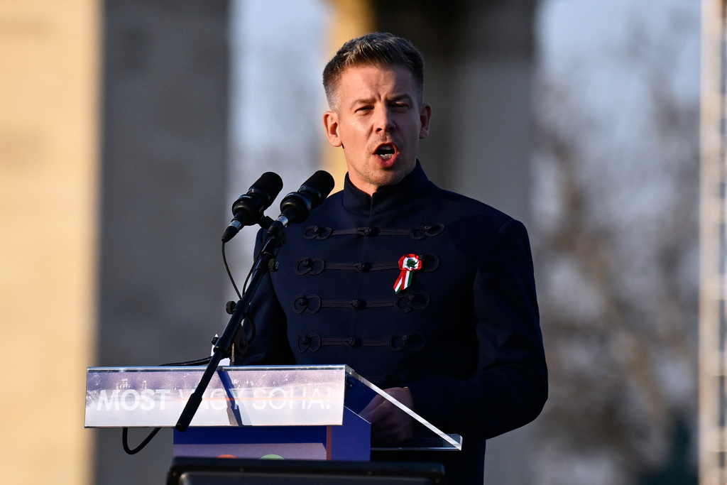 Opposition leader Peter Magyar addresses his supporters during a march in Budapest, Sunday, March 15, 2026. (AP Photo/Denes Erdos)
