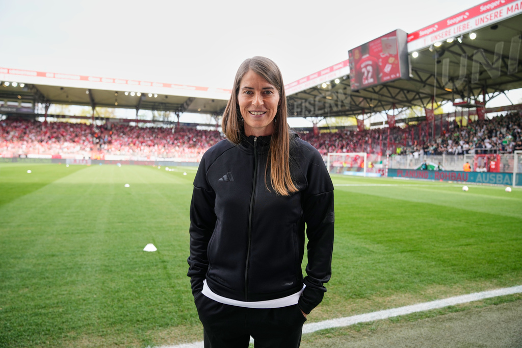 New head coach of German Bundesliga soccer club 1. FC Union Berlin Marie-Louise Eta looks on during the warm up prior to the German Bundesliga soccer match between FC Union Berlin and Wolfsburg in Berlin, Germany, Saturday, April 18, 2026. (AP Photo/Ebrahim Noroozi)