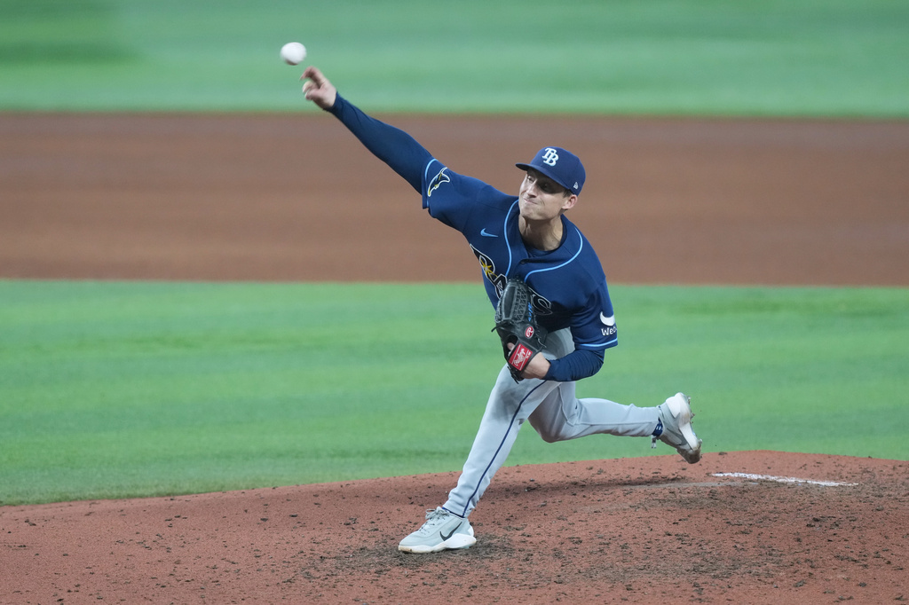 Tampa Bay Rays pitcher Griffin Jax aims a pitch during the fifth inning of a baseball game against the Miami Marlins Sunday, June 7, 2026, in Miami. (AP Photo/Marta Lavandier)