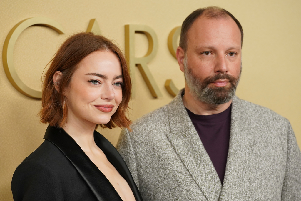 Emma Stone, left, and Yorgos Lanthimos arrive at the 98th Academy Awards Oscar nominees luncheon on Tuesday, Feb. 10, 2026, at the Beverly Hilton Hotel in Beverly Hills, Calif. (Photo by Jordan Strauss/Invision/AP)