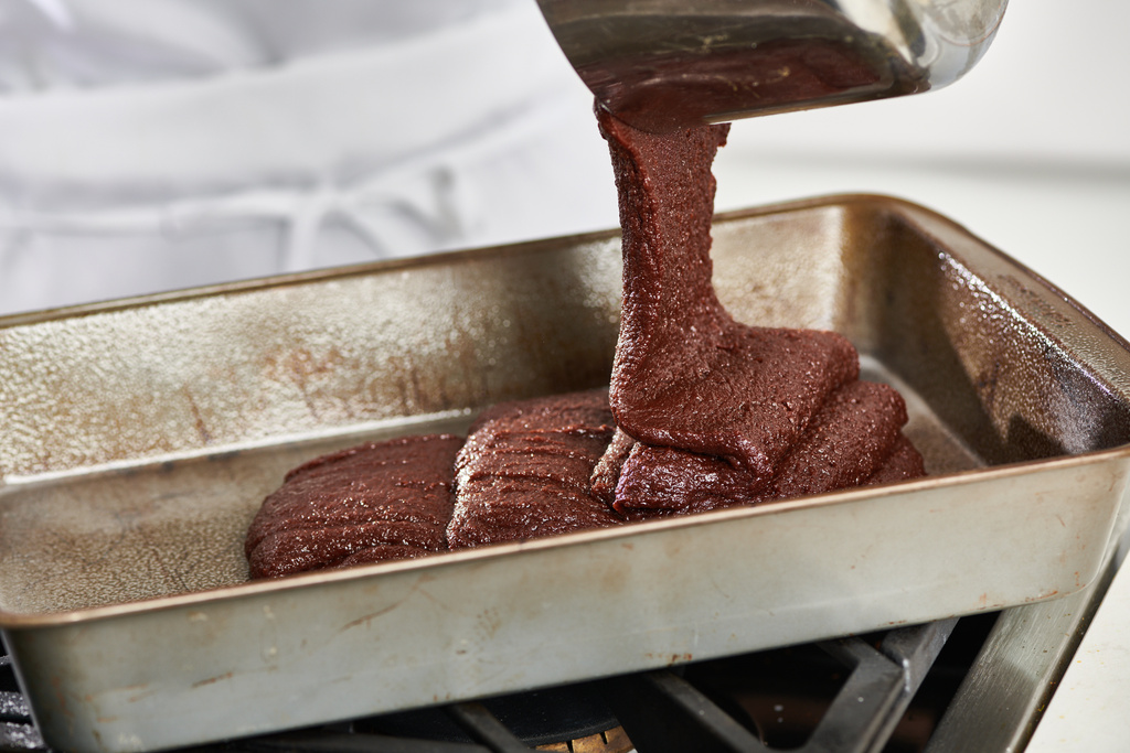 Brownie batter is poured into a pan in New York on Oct. 7, 2020. (Cheyenne M. Cohen via AP)