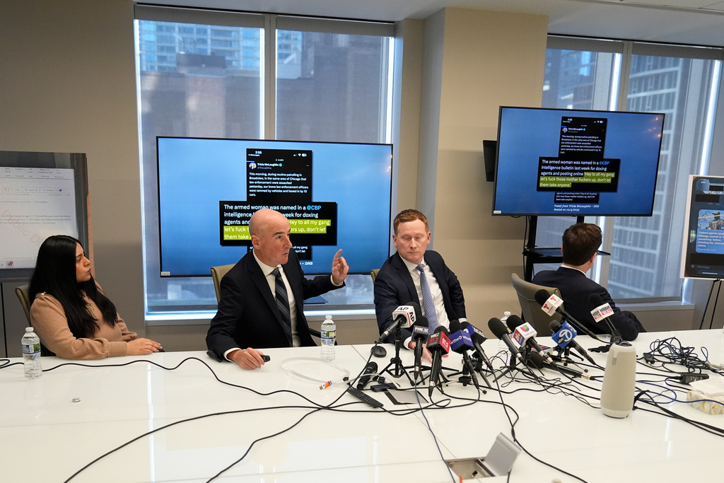 Marimar Martinez, left, a woman who was shot by a Border Patrol agent last year, sits with her attorneys during a press conference Wednesday, Feb. 11, 2026, in Chicago. (AP Photo/Erin Hooley)