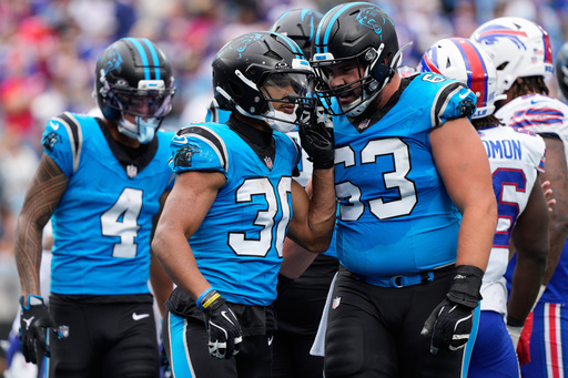 Carolina Panthers running back Chuba Hubbard (30) reacts after a touchdown against the Buffalo Bills during the second half an NFL football game, Sunday, Oct. 26, 2025, in Charlotte, N.C. (AP Photo/Jacob Kupferman) Carolina Panthers running back Chuba Hubbard (30) reacts after a touchdown against the Buffalo Bills during the second half an NFL football game, Sunday, Oct. 26, 2025, in Charlotte, N.C. (AP Photo/Jacob Kupferman)