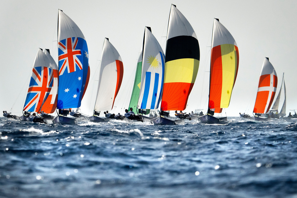 FILE - A fleet of boats from around the world compete in a men's skiff event sailing race Sunday July 28, 2024, during 2024 Summer Olympics sailing competition in Marseille, France. (AP Photo/Jacquelyn Martin, File)