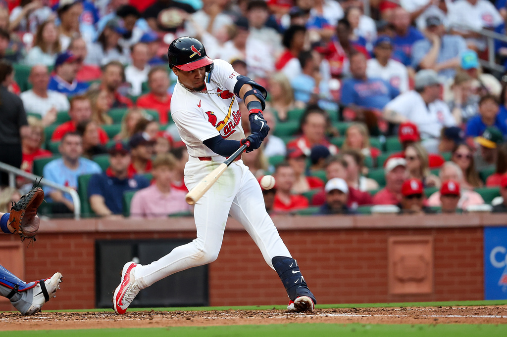 St. Louis Cardinals' Masyn Winn hits a two RBI single during the third inning of a baseball game against the Chicago Cubs Sunday, May 31, 2026, in St. Louis. (AP Photo/Scott Kane)