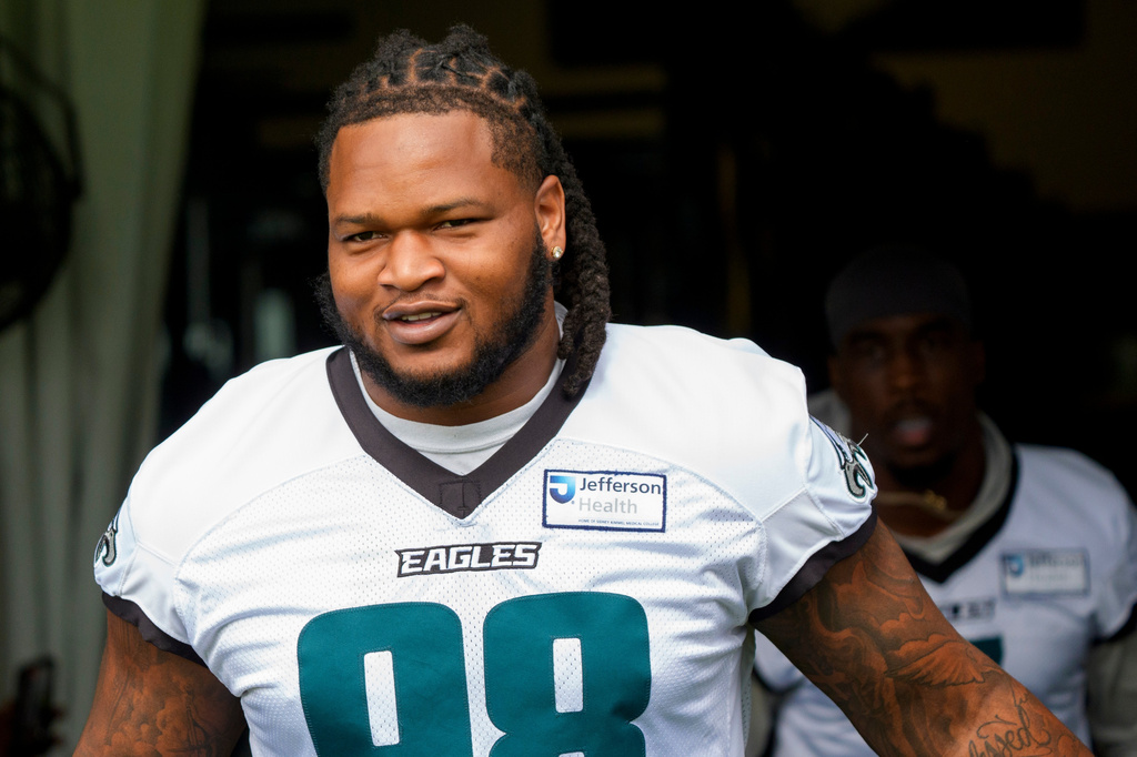 Philadelphia Eagles defensive tackle Jalen Carter (98) takes to the field for practice at the team's NFL football training camp in Philadelphia, Thursday, July 30, 2026. (AP Photo/Chris Szagola)