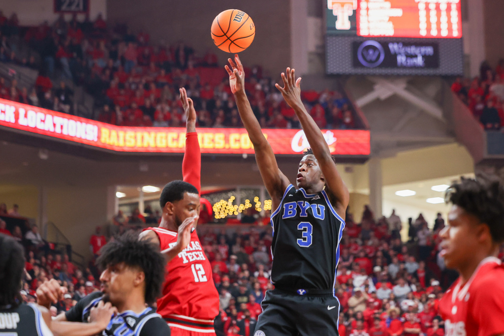 BYU forward AJ Dybantsa (3) shoots against Texas Tech during the first half of an NCAA college basketball game Saturday, Jan. 17, 2026, in Lubbock, Texas. (AP Photo/Chase Seabolt)