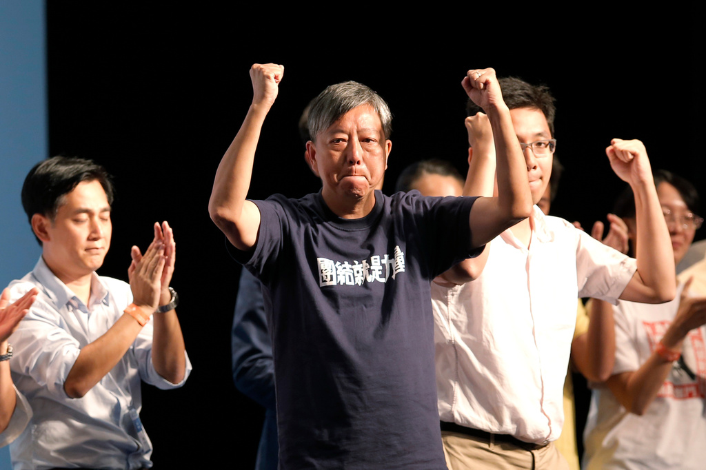 FILE - Pro-democracy candidate Lee Cheuk-yan reacts after losing a seat at the legislative council elections in Hong Kong, on Sept. 5, 2016. (AP Photo/Kin Cheung, File)
