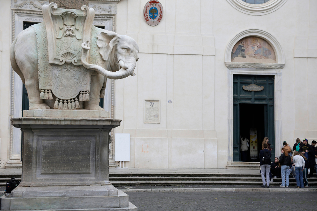 The iconic Elephant and Obelisk monument in Rome, designed by Baroque sculptor Gian Lorenzo Bernini, is seen without the tip of the left tusk on Wednesday, Feb. 18, 2026, after Police found an 11-centimeter (4-inch) marble fragment near the statue over the weekend. (Cecilia Fabiano/Lapresse via AP)