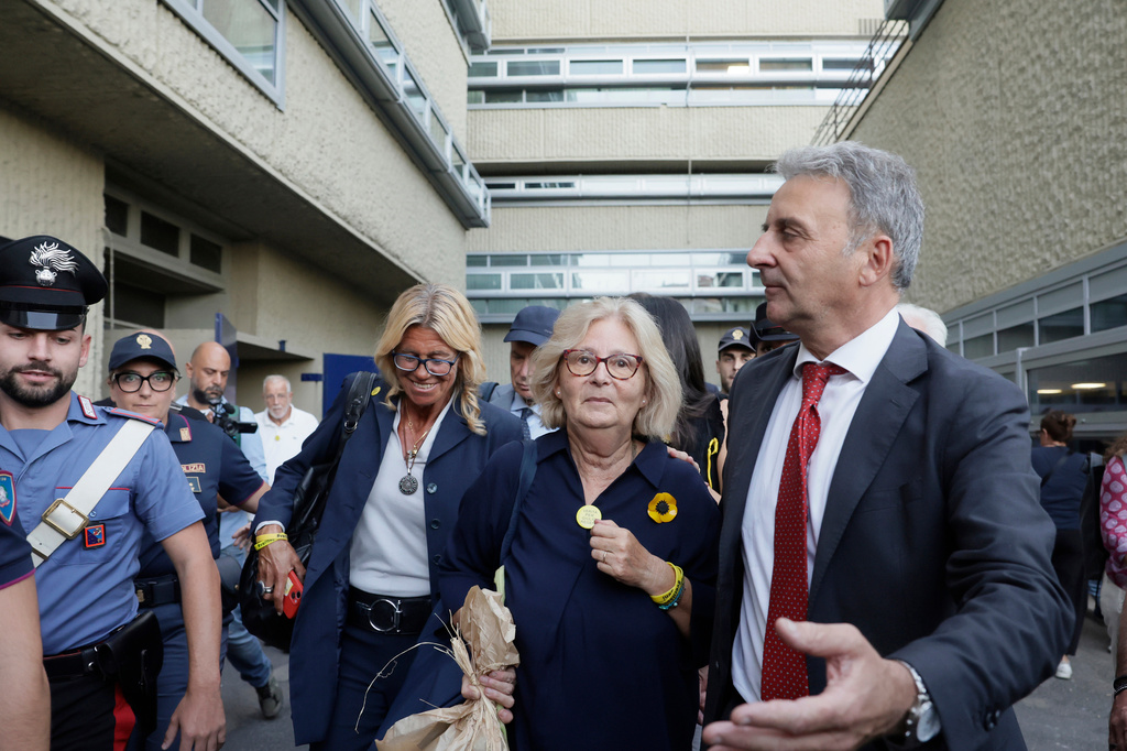 Paola Deffendi, Giulio Regeni's mother, center, leaves a courtroom after three of four Egyptian security officials were convicted to 10 years in prison for the abduction and murder of her son in Cairo in 2016, in Rome, Monday, Sept. 28, 2026. (Cecilia Fabiano/LaPresse via AP)