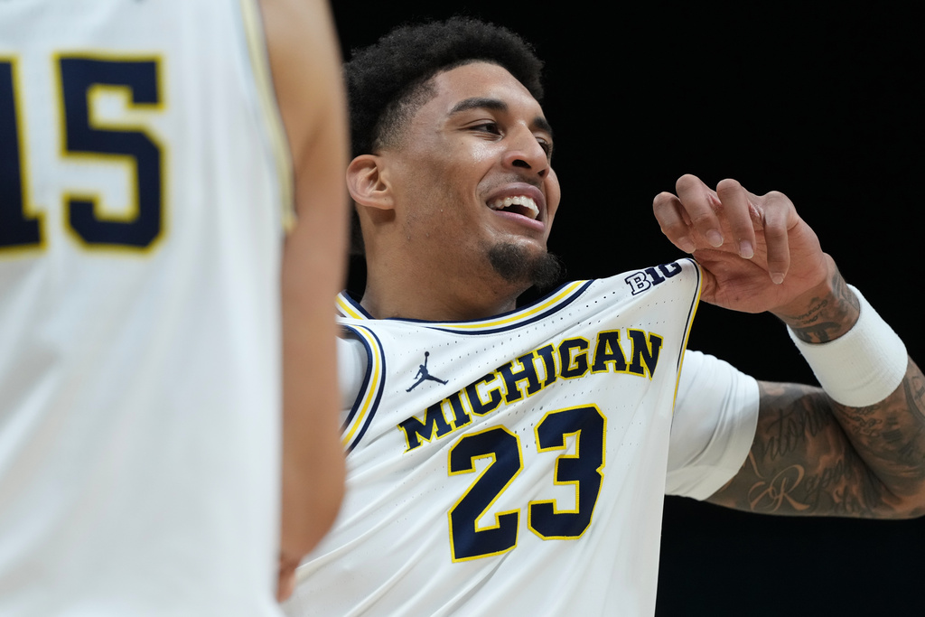 Michigan forward Yaxel Lendeborg (23) celebrates a play against Gonzaga during the second half of an NCAA college basketball game in the Players Era tournament in Las Vegas, Wednesday, Nov. 26, 2025. (AP Photo/Eric Gay)