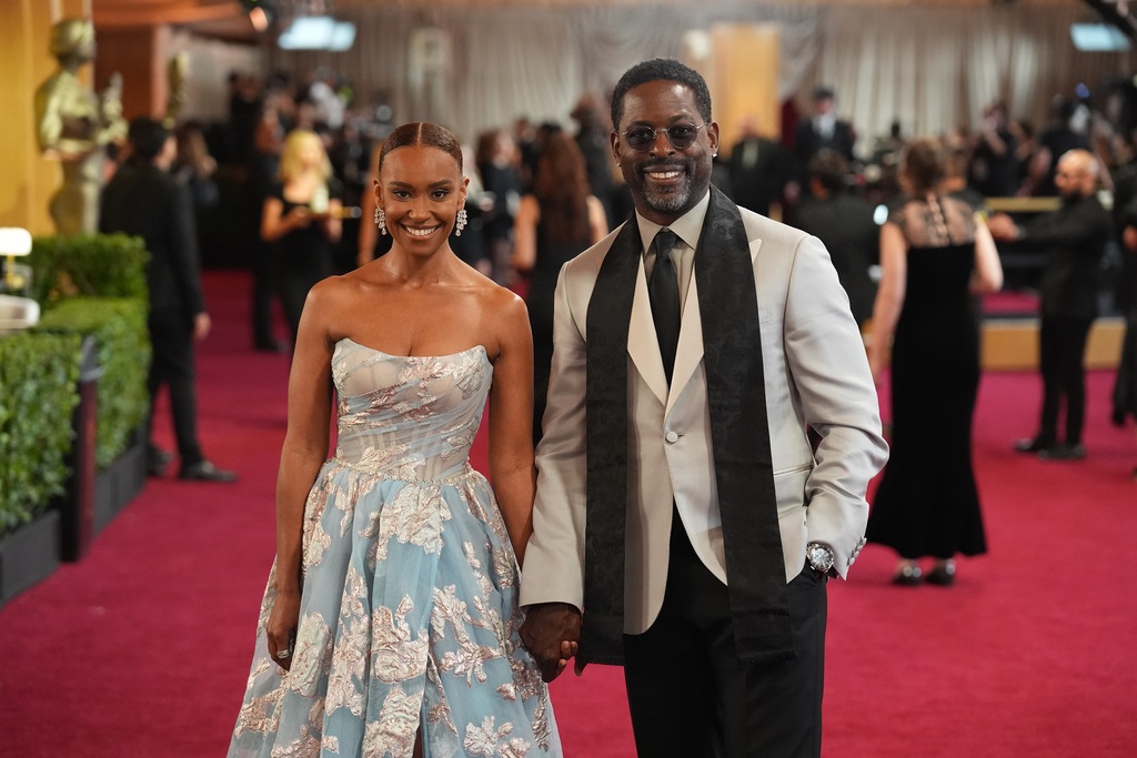 Ryan Michelle Bathe, left, and Sterling K. Brown arrive at the 32nd Annual Actor Awards on Sunday, March 1, 2026, at the Shrine Auditorium and Expo Hall in Los Angeles. (AP Photo/Chris Pizzello)