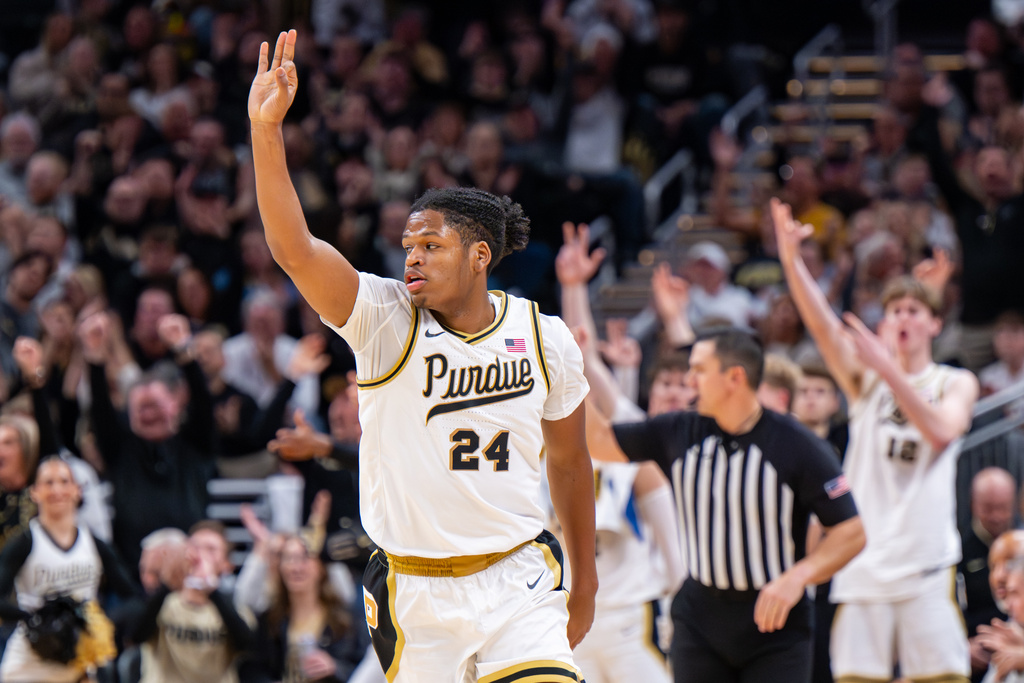 Purdue guard Gicarri Harris (24) reacts after scoring during the second half of an NCAA college basketball game against Auburn, Saturday, Dec. 20, 2025, in Indianapolis (AP Photo/Doug McSchooler)