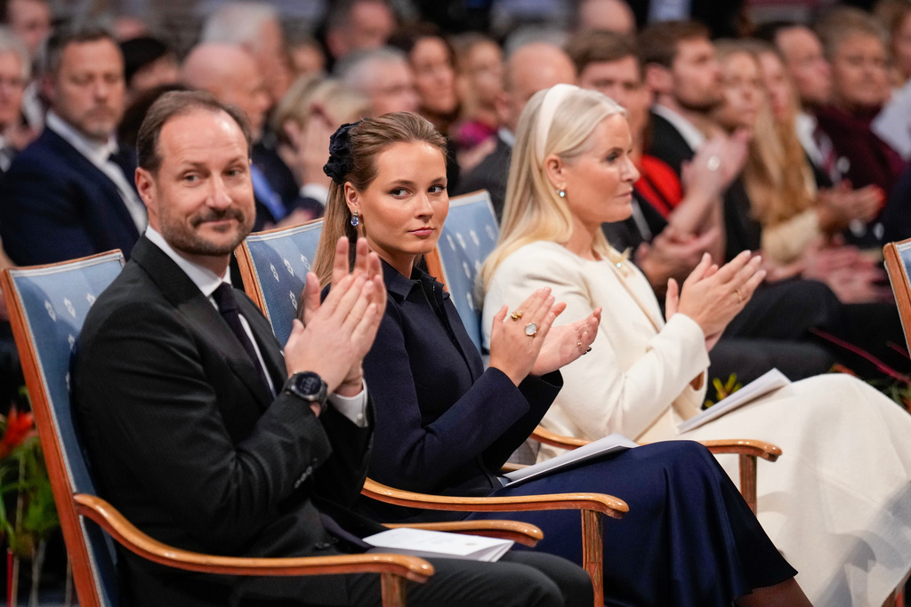 FILE -Norway's Crown Prince Haakon, Crown Princess Mette-Marit and Princess Ingrid Alexandra applaud during the Nobel Peace Prize award ceremony, in Oslo, Norway, Dec. 10, 2025. (Ole Berg-Rusten/NTB Scanpix, Pool via AP), File)