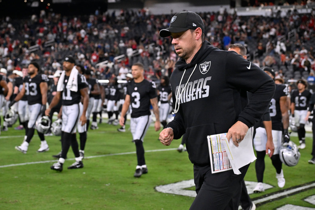 Las Vegas Raiders head coach Klint Kubiak runs on the field after an NFL preseason football game against the San Francisco 49ers, Thursday, Aug. 27, 2026, in Las Vegas. (AP Photo/David Becker)