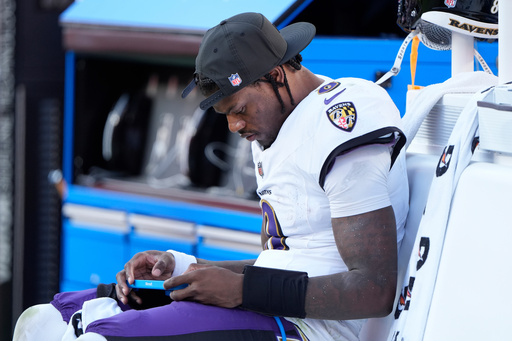 Baltimore Ravens quarterback Lamar Jackson sits on the bench after being replaced by Cooper Rush during the second half of an NFL football game against the Kansas City Chiefs Sunday, Sept. 28, 2025, in Kansas City, Mo. (AP Photo/Charlie Riedel) Baltimore Ravens quarterback Lamar Jackson sits on the bench after being replaced by Cooper Rush during the second half of an NFL football game against the Kansas City Chiefs Sunday, Sept. 28, 2025, in Kansas City, Mo. (AP Photo/Charlie Riedel)