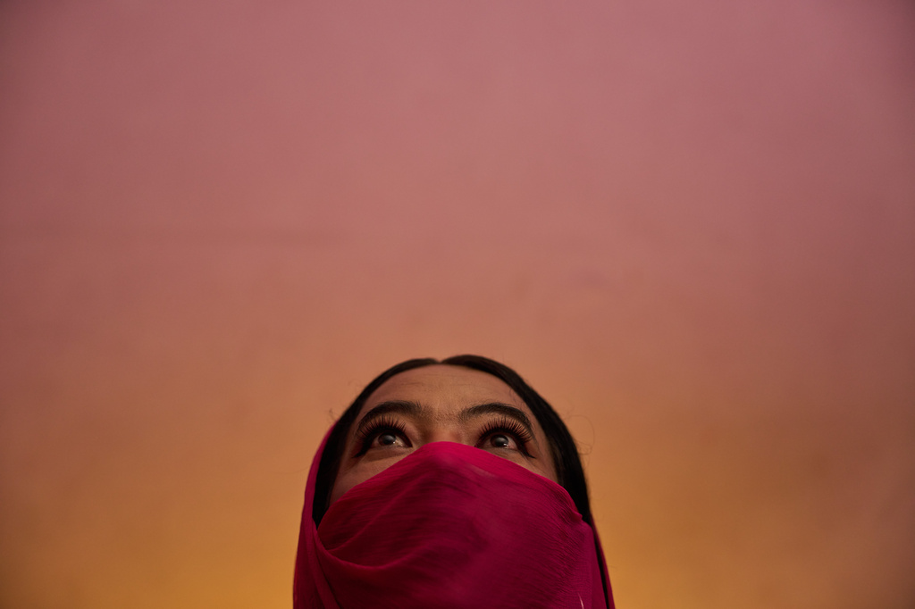 Barsha Magar, a former aid worker who turned to sex work to survive after losing her job amid the U.S. foreign aid cuts, poses for a photo, Sunday, May 17, 2026, in Hetauda, Nepal. Magar spent 16 years as an HIV outreach worker and peer educator for the NGO Friends Hetauda before turning in desperation to sex work, where she has been raped at gunpoint. (AP Photo/Bram Janssen)